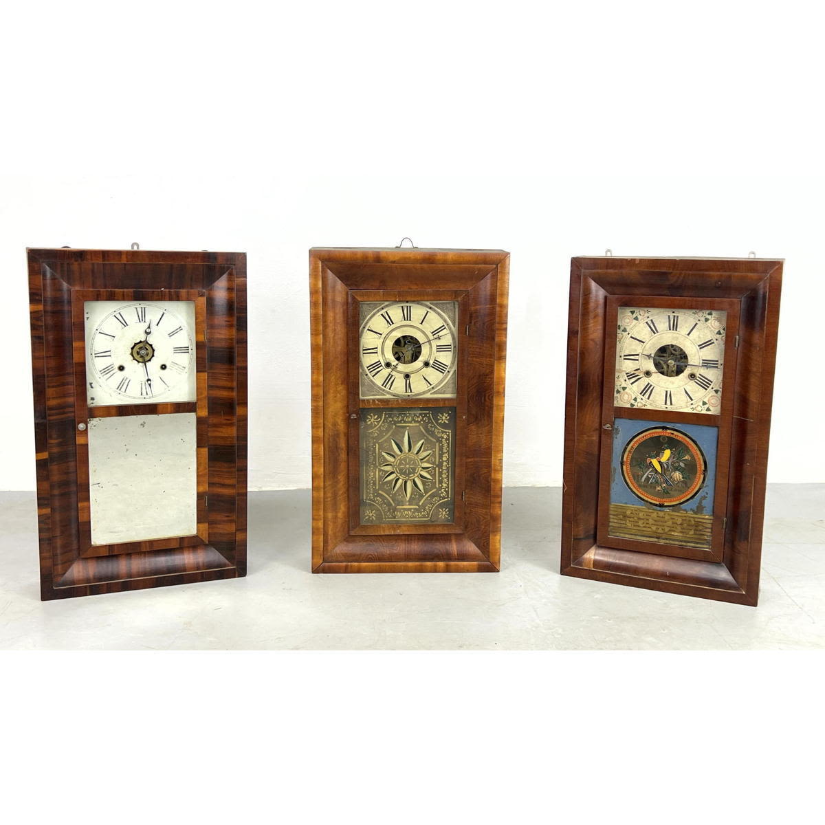 Appraisal: Collection Three American Mahogany Ogee Clocks Two Reverse Painted One