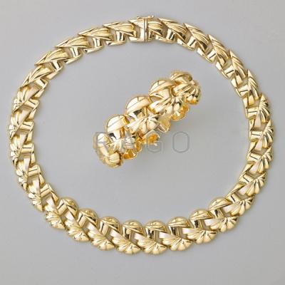 Appraisal: RETRO STYLE K YELLOW GOLD NECKLACE AND BRACELET Bright and