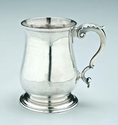 Appraisal: George III English silver mug baluster form with leaf-capped double