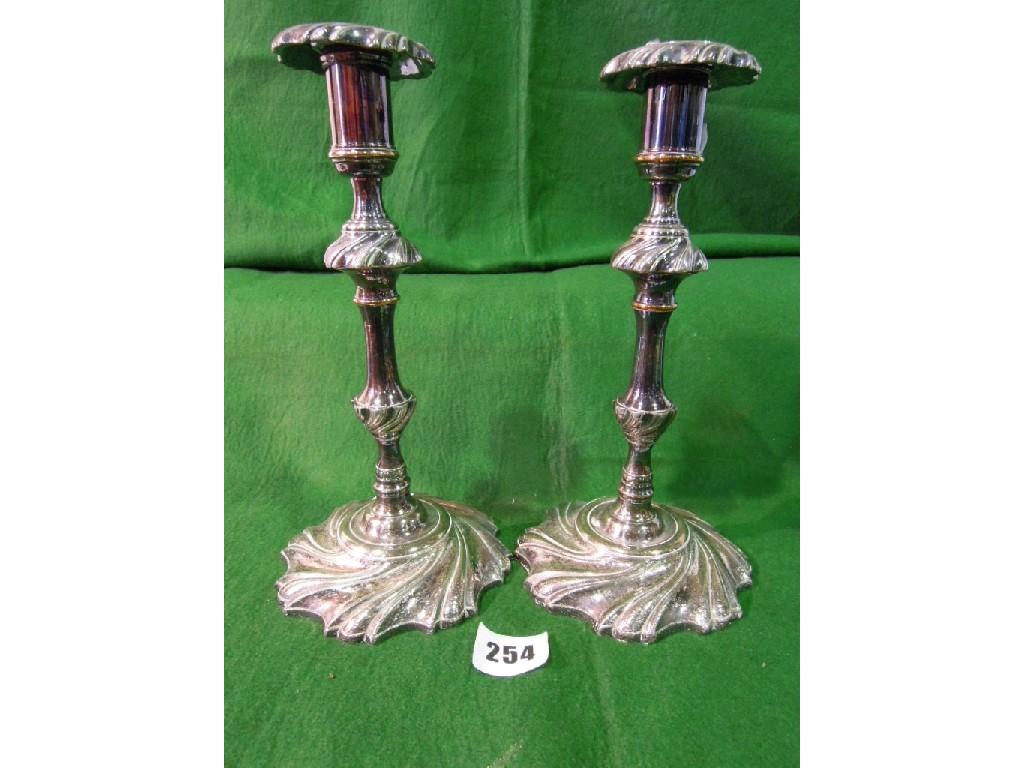 Appraisal: A pair of silver plated candlesticks of wrythen form