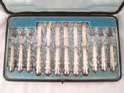 Appraisal: Six pairs of silver handled fruit knives and forks Sheffield