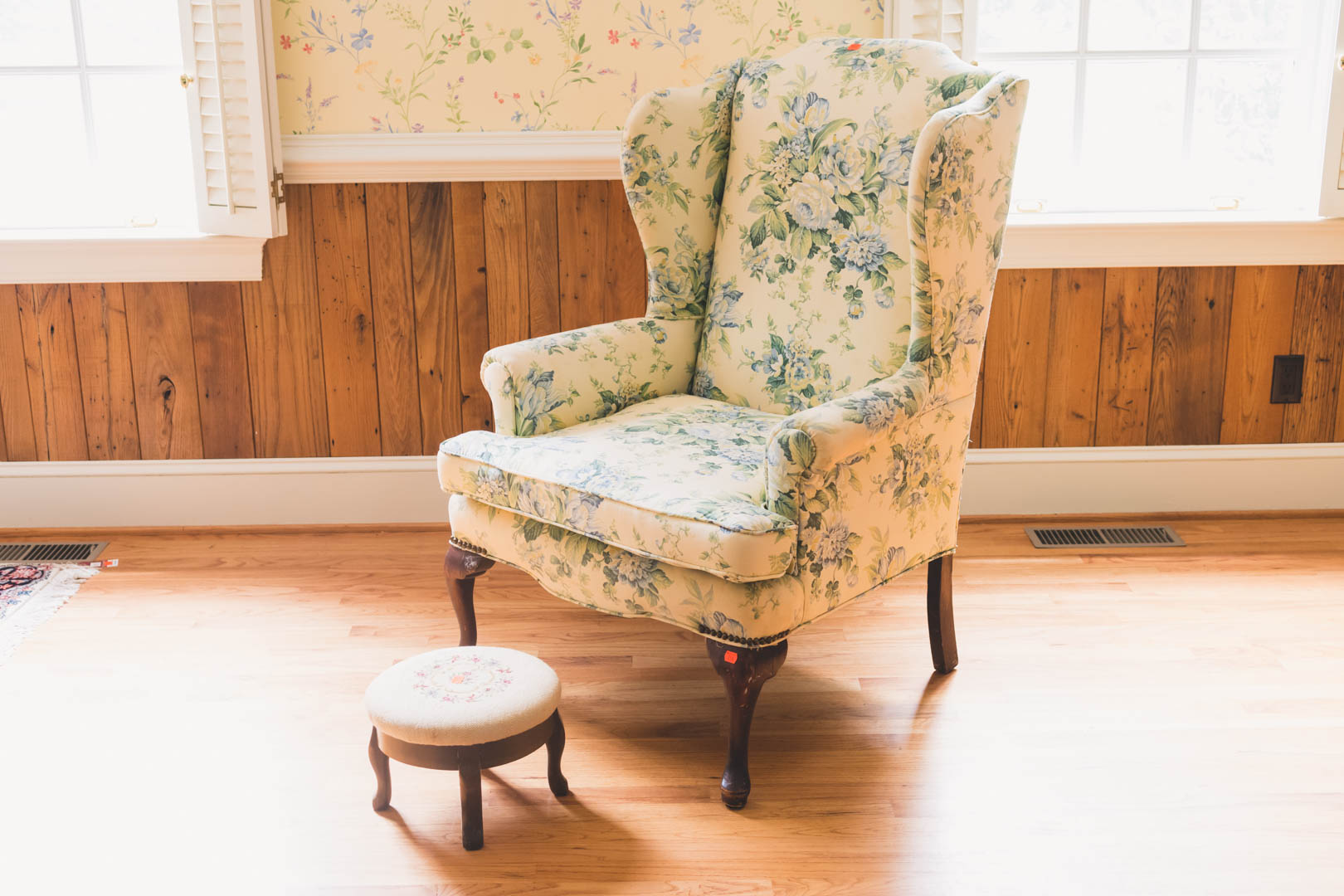 Appraisal: Queen Anne style upholstered wing chair along with a needlepoint