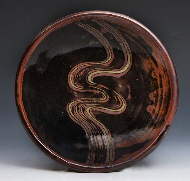 Appraisal: Michael Cardew British - Dish combed tenmoku glazeAbuja Potteryimpressed potter's