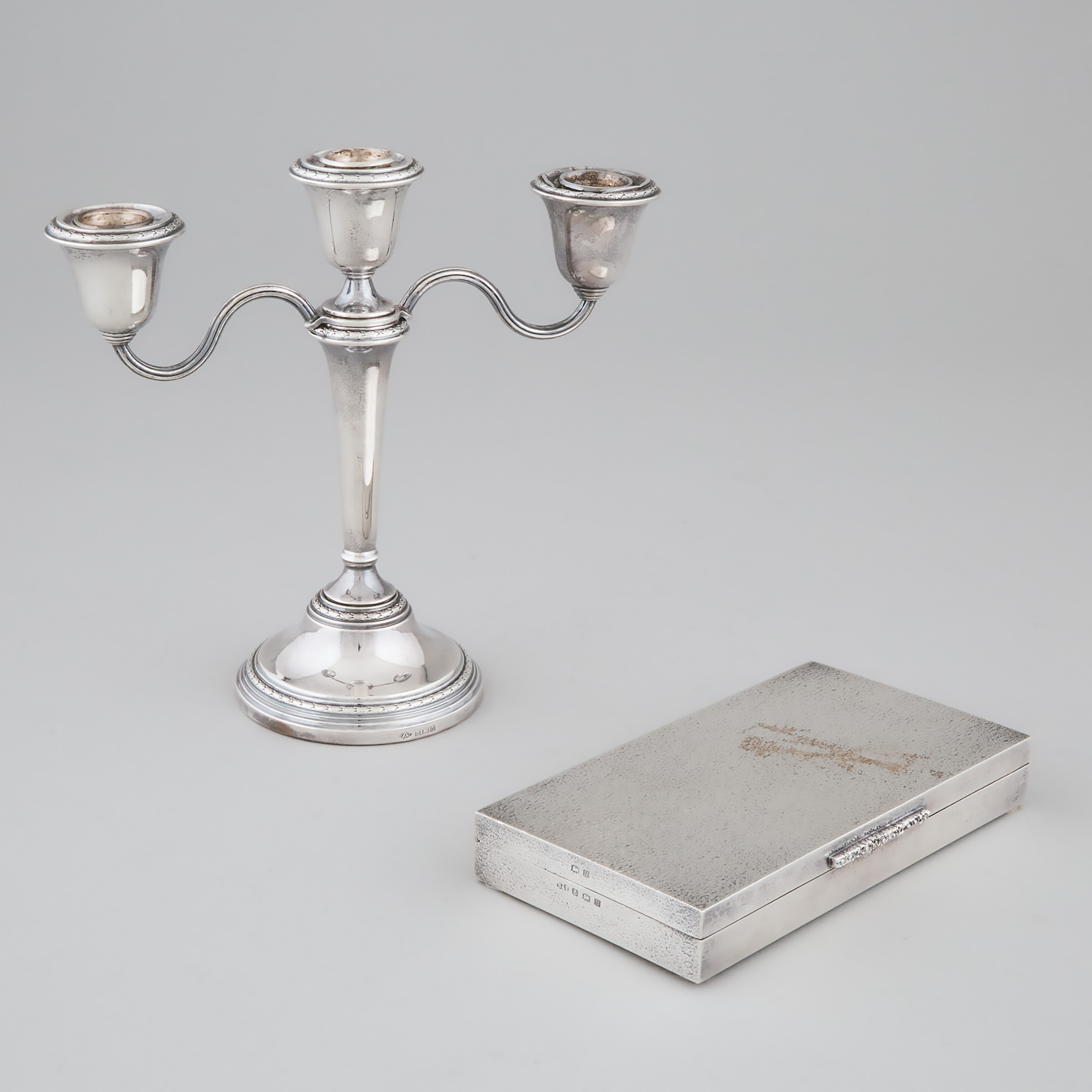 Appraisal: English Silver Three-Light Candelabrum and Cigarette Box Adie Brothers and