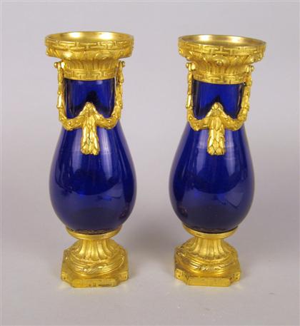 Appraisal: Pair of cobalt glass and gilt bronze mounted vases Each