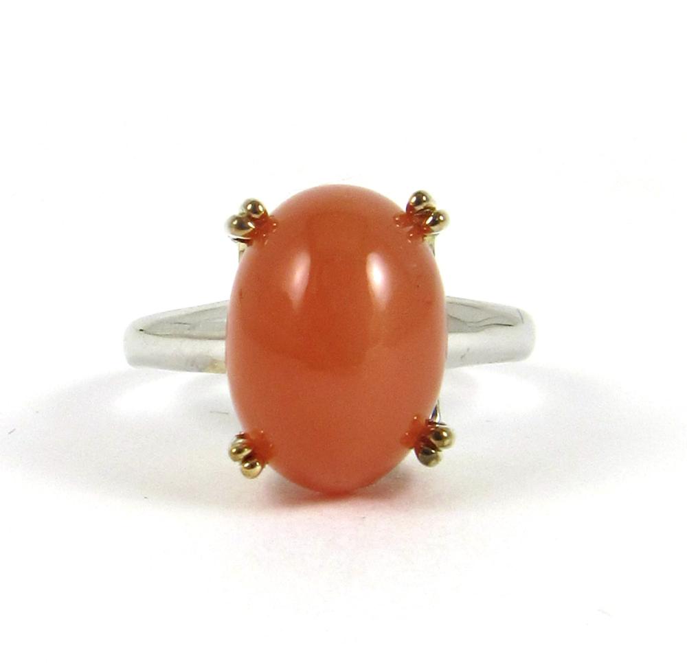 Appraisal: ORANGE MOONSTONE AND FOURTEEN KARAT GOLD RING The k white