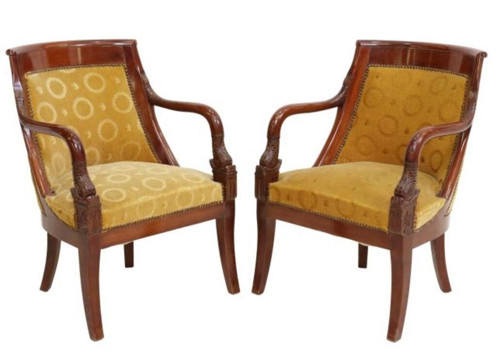 Appraisal: pair French Empire style mahogany armchairs th c having scrolled