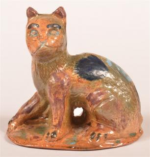 Appraisal: Stahl Redware Figure of a Seated Cat Stahl Redware Pottery