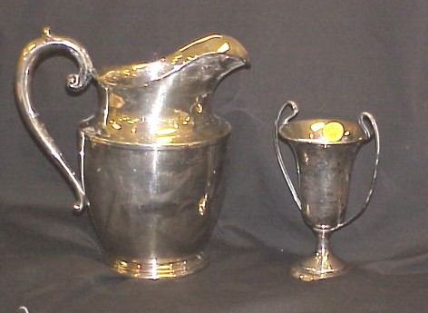 Appraisal: Wallace pt water pitcher oz and small loving cup trophy