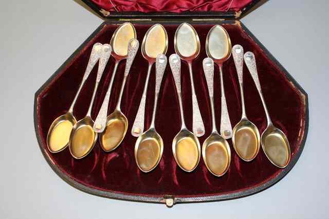 Appraisal: A CASED SET OF TWELVE VICTORIAN SILVER SORBET SPOONS the