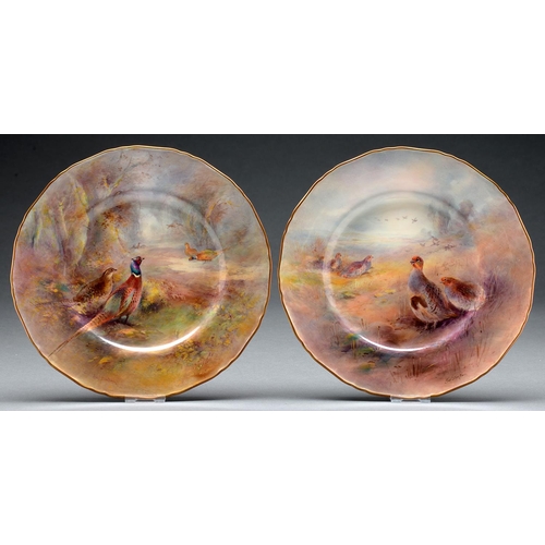 Appraisal: A pair of Royal Worcester plates painted by Jas Stinton