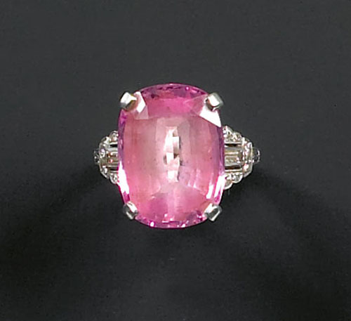 Appraisal: Pink sapphire and diamond ring with platinum setting and cushion