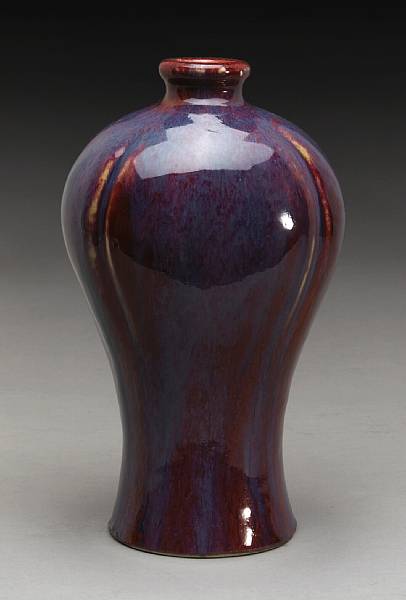 Appraisal: A flamb glazed bud vase Late th Century Early th