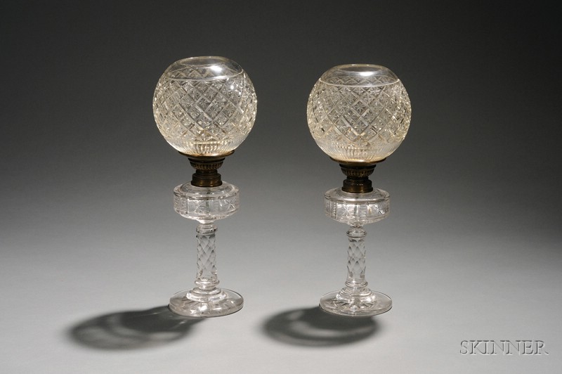 Appraisal: Pair of Colorless Cut Glass Kerosene Lamps with Globular Shades