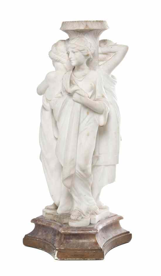 Appraisal: A Marble Figural Pedestal depicting the Three Graces carved in