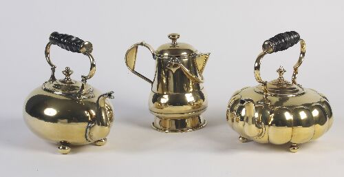 Appraisal: A th century brass kettle with turned wood handle ovoid