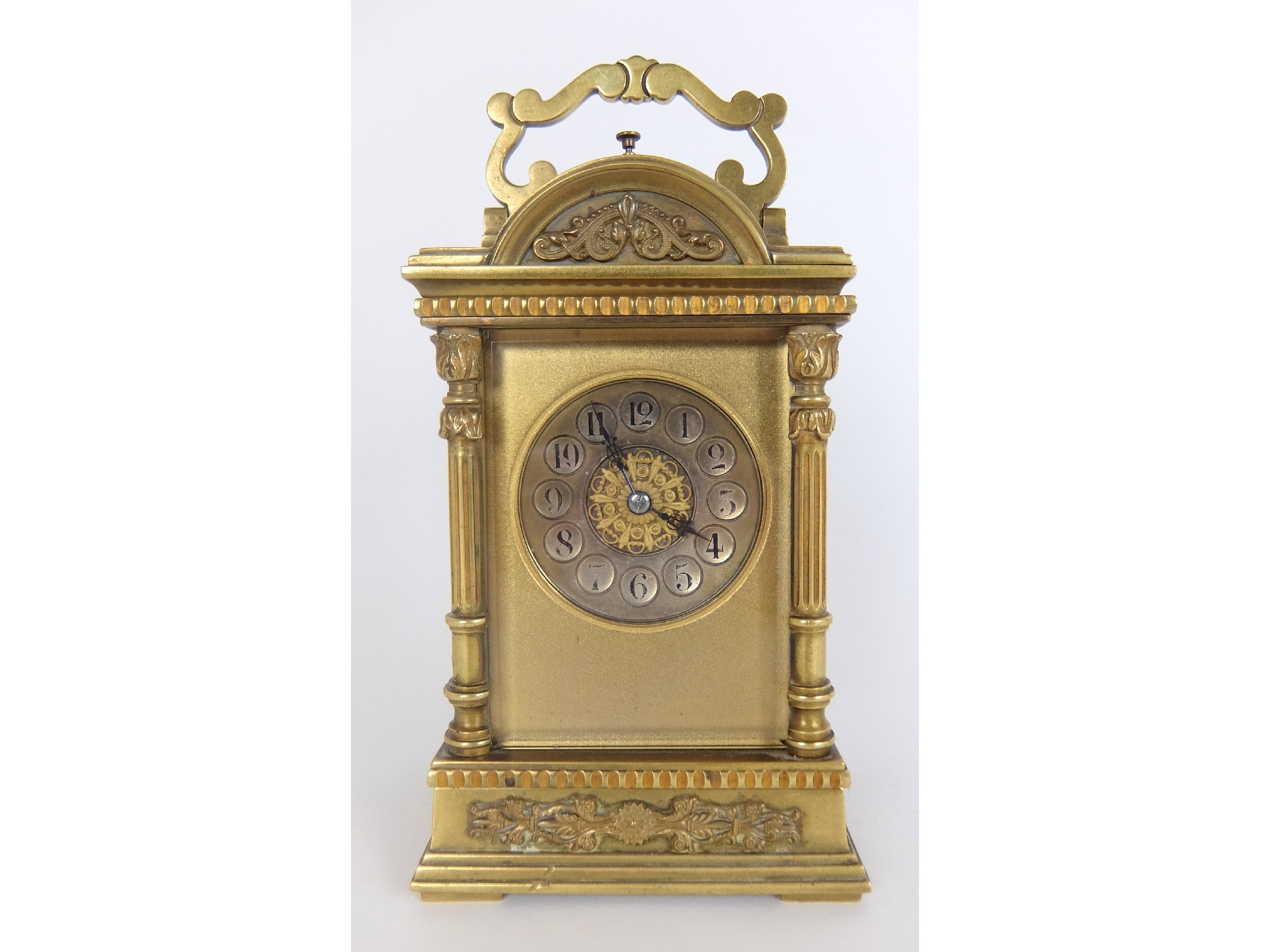 Appraisal: A French brass repeater carriage clockthe domed bevelled glass top