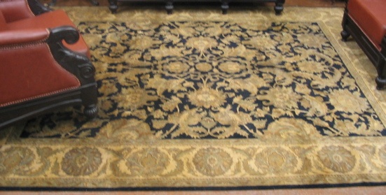 Appraisal: HAND KNOTTED ORIENTAL CARPET Indo-Persian overall leafy vine decoration on