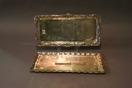 Appraisal: A rectangular silver plate tray in the Jugendstil taste together