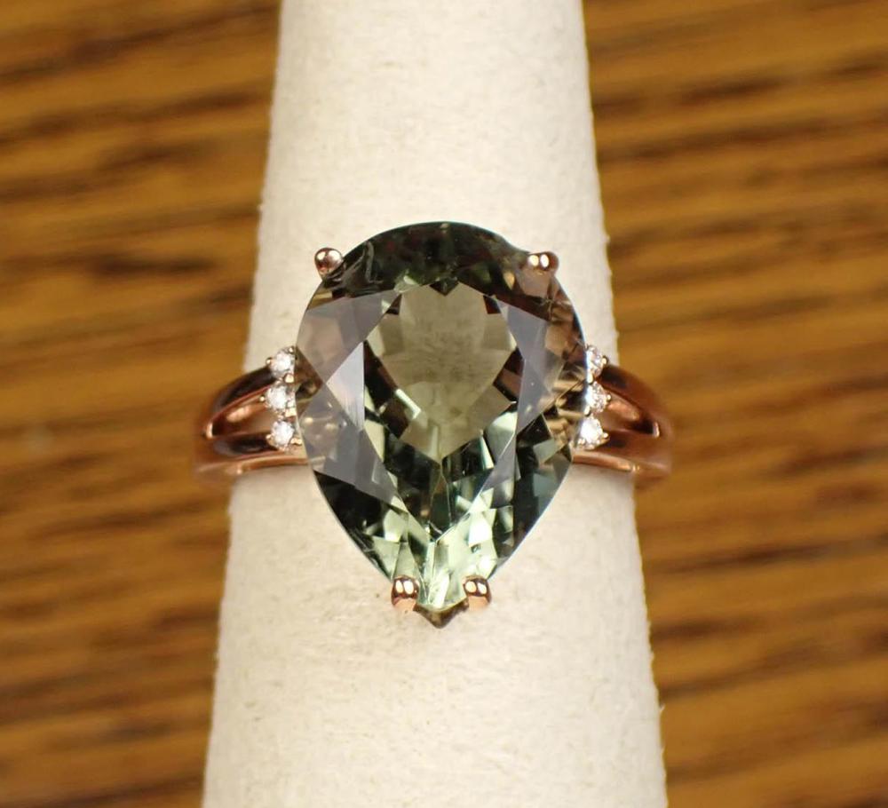 Appraisal: PRASIOLITE DIAMOND AND FOURTEEN KARAT GOLD RING The rose gold