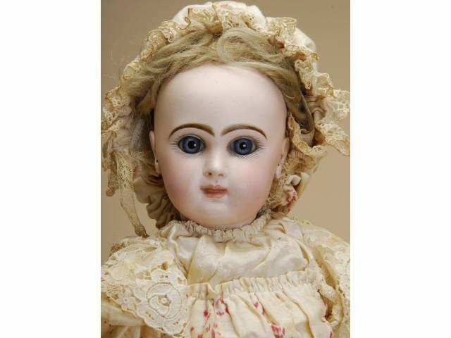 Appraisal: Tete Jumeau Bebe France ca poured bisque socket head stamped