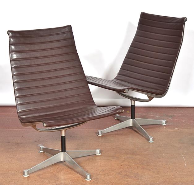 Appraisal: PAIR OF EAMES ALUMINIUM GROUP CHAIRS UPHOLSTERED IN BROWN LEATHER