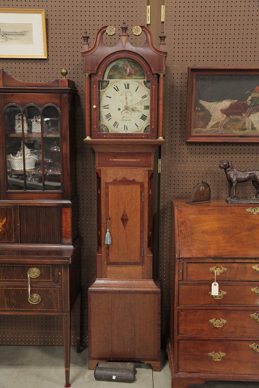 Appraisal: TALL CASE CLOCK Mixed woods case having a broken arch