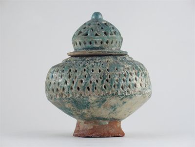 Appraisal: A Middle Eastern reticulated vase and cover after a metal