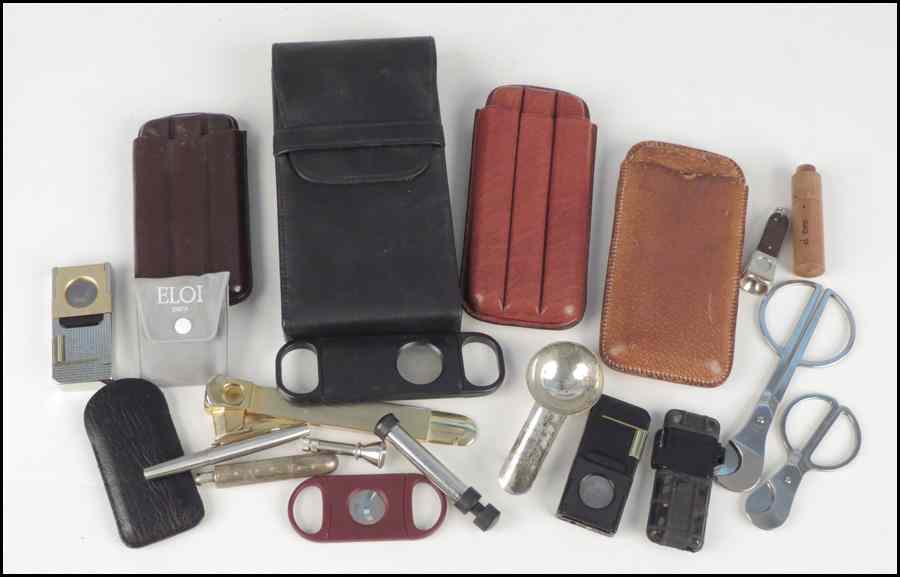 Appraisal: COLLECTION OF CIGAR ACCESSORIES Comprised of four leather cigar cases