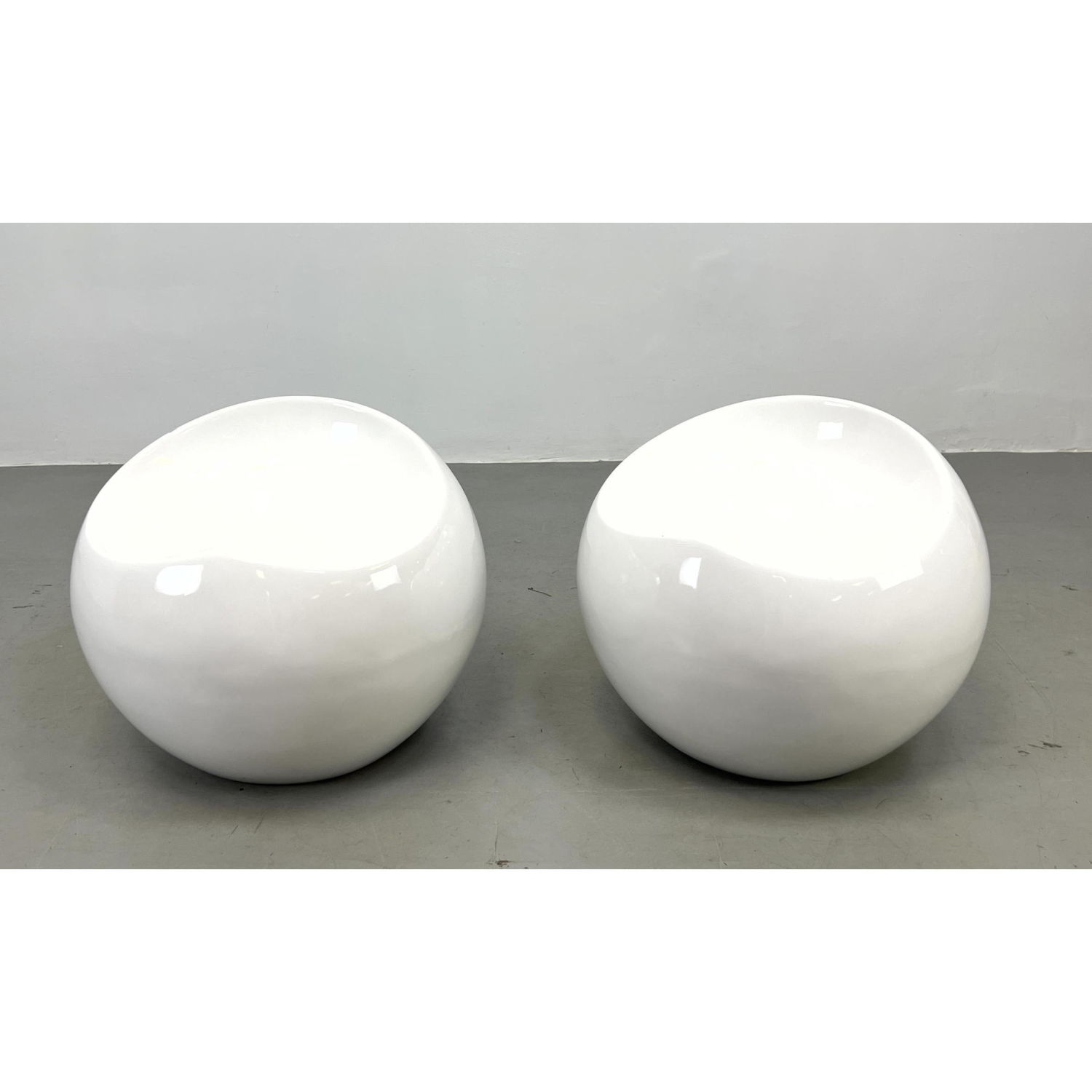 Appraisal: Pr Molded Modernist White Ball Chairs Seats White enamel finish