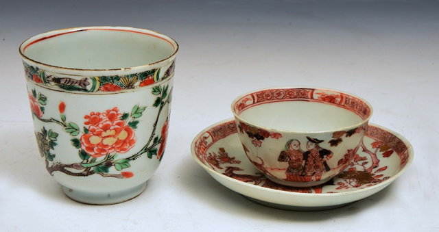 Appraisal: A CHINESE TEA BOWL and saucer decorated with Dutch figures