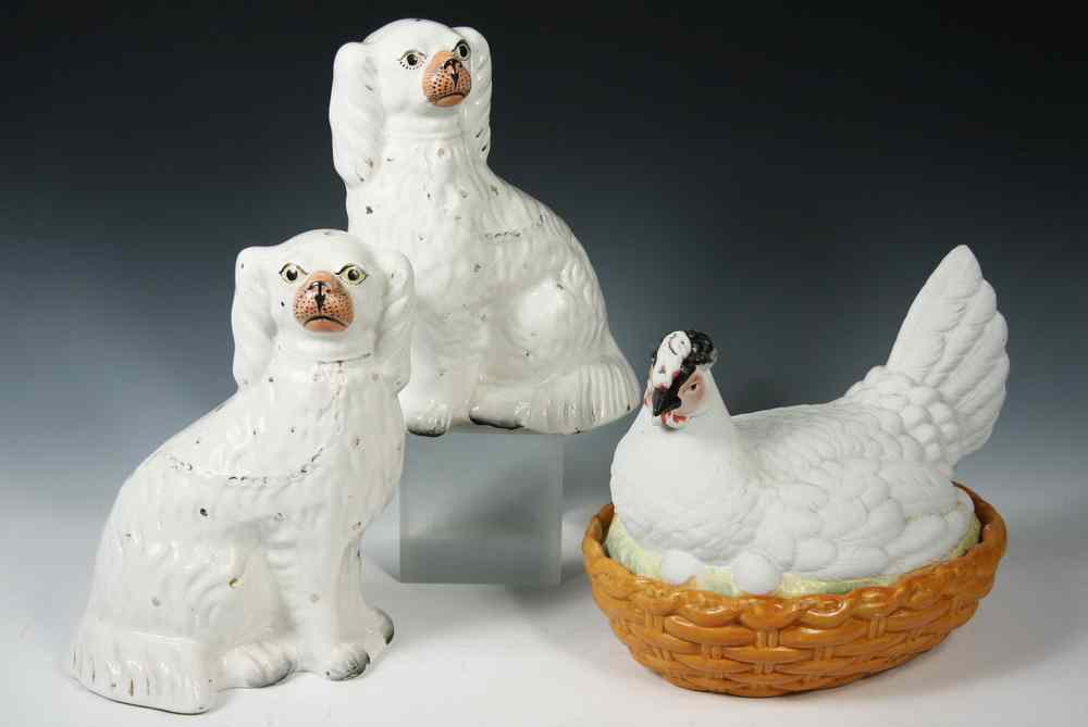 Appraisal: STAFFORDSHIRE DOGS - Pair th c White Spaniel Staffordshire Mantel