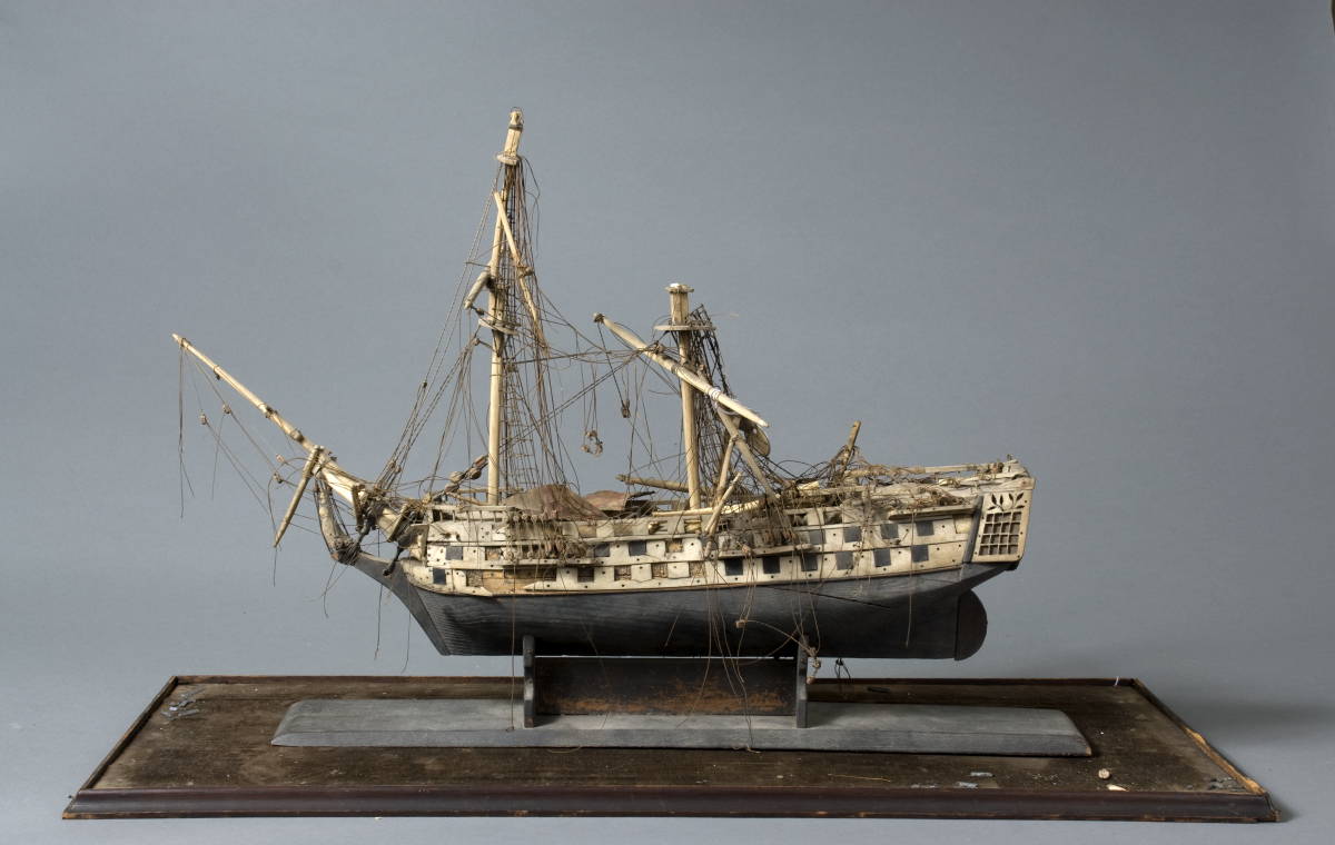 Appraisal: CASED SCRIMSHAW MODEL OF THE BRITISH SHIP OF THE LINE