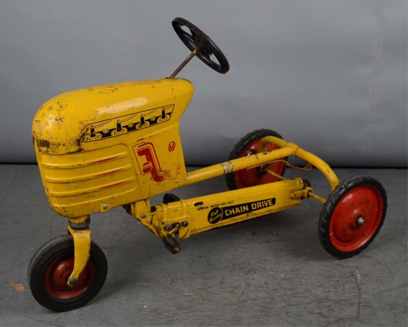 Appraisal: Pressed Steel Murray Tractor Pedal Car This yellow tractor appears