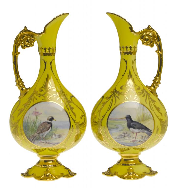 Appraisal: A PAIR OF EWERS painted by S D Nowacki both