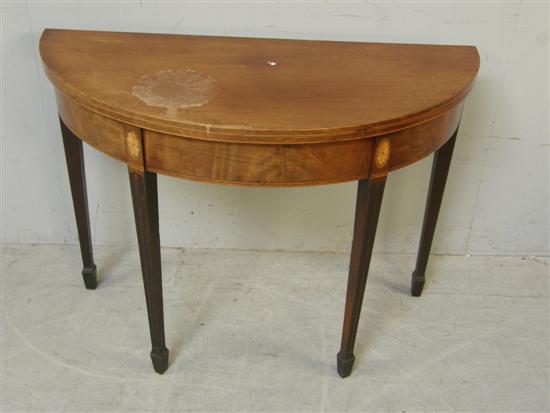 Appraisal: th century mahogany and crossbanded folding demi-lune tea table with