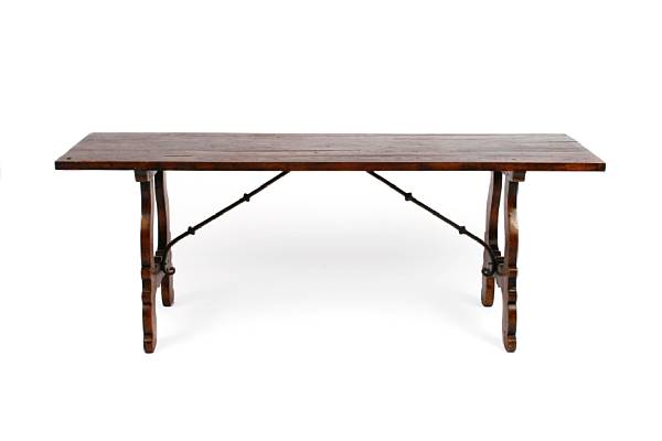 Appraisal: A Spanish Baroque style walnut trestle table height in width