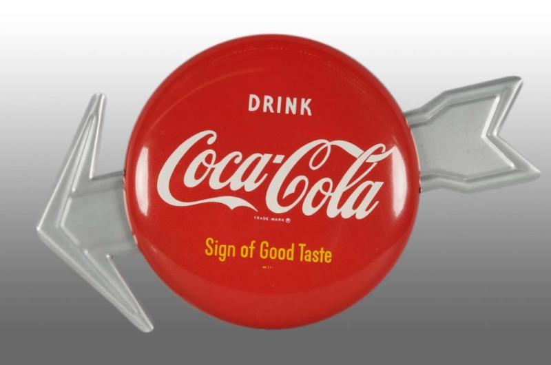 Appraisal: Tin Coca-Cola Button with Arrow Description Includes connecting hardware Only