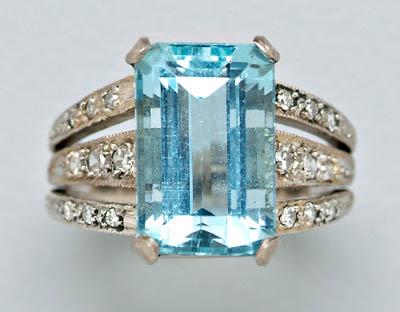 Appraisal: Aquamarine and diamond ring one emerald-cut aquamarine estimated weight cts