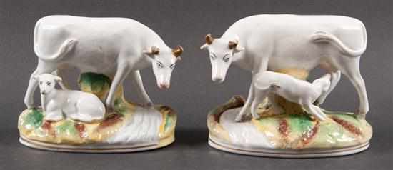 Appraisal: Pair of Staffordshire painted earthenware cow and calf figural groups