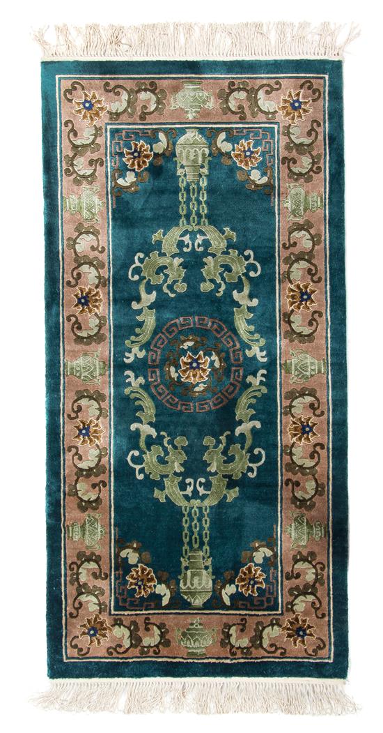 Appraisal: Sale Lot A Silk Rug of rectangular form centered with