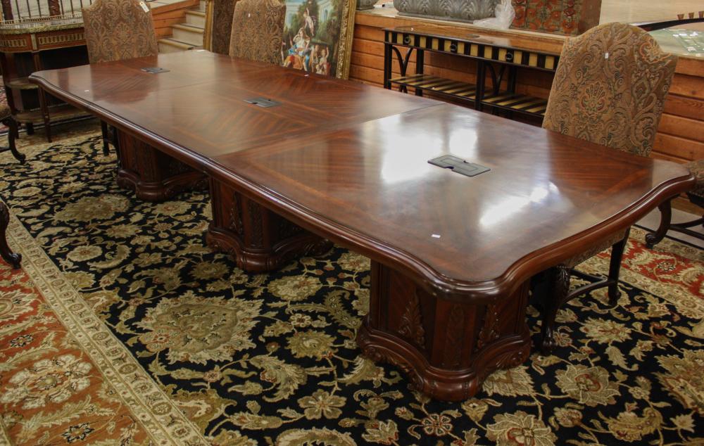 Appraisal: THREE-PART MAHOGANY CONFERENCE TABLE a rectangular design on three column