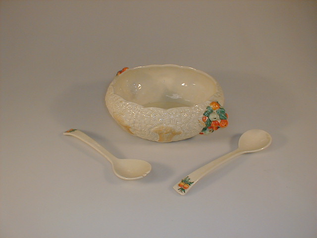 Appraisal: A Clarice Cliff Celtic harvest salad bowl with fruit clusters