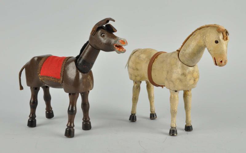 Appraisal: Lot Of Schoenhut Wooden Animal Figures One horse and one