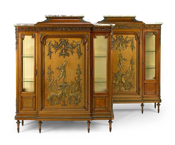 Appraisal: A pair of Louis XVI style gilt bronze mounted mahogany