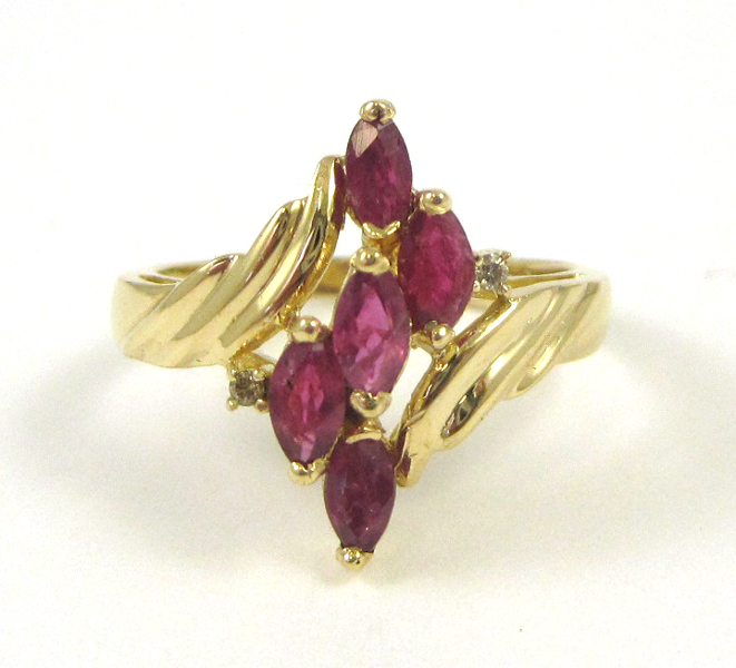 Appraisal: RUBY DIAMOND AND FOURTEEN KARAT GOLD RING set with two