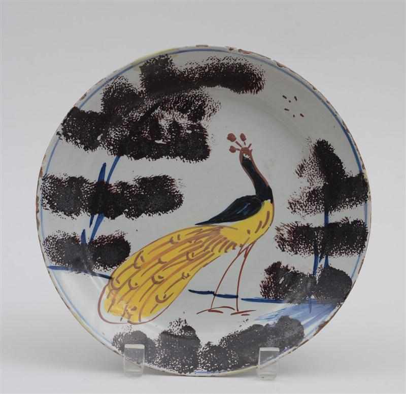 Appraisal: BRISTOL DELFT POLYCHROME PLATE Circa showing a peacock with black