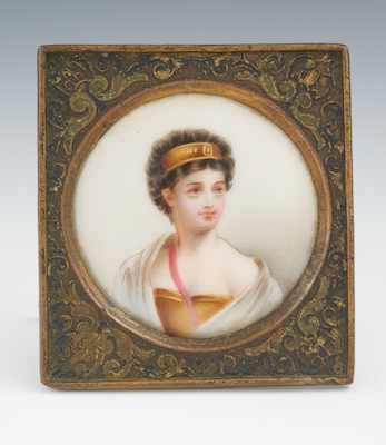 Appraisal: A Miniature Porcelain Portrait Plaque A young beauty with dark