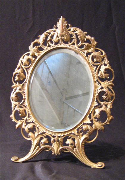 Appraisal: Louis XV style gilt metal frame The oval mirror plate