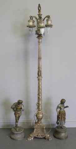 Appraisal: Pair of Metal Figures together with Silvered FloorLamp Lamp is